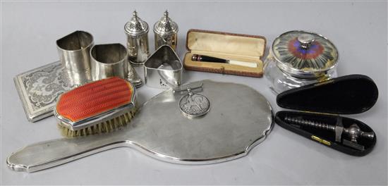 Assorted silver including a pair of engine turned napkin rings, pair of pepperettes and a hand mirror and three other items